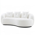 Ovendraq white sofa with a curved front and light-colored cushions, showcasing a modern, stylish living room furniture piece.