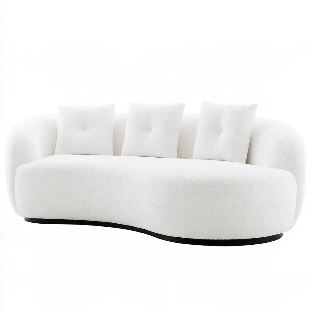 Ovendraq white sofa with a curved front and light-colored cushions, showcasing a modern, stylish living room furniture piece.
