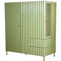 Green Ovendraq armario with striated doors and side drawers, showcasing modern storage design and textured finish.