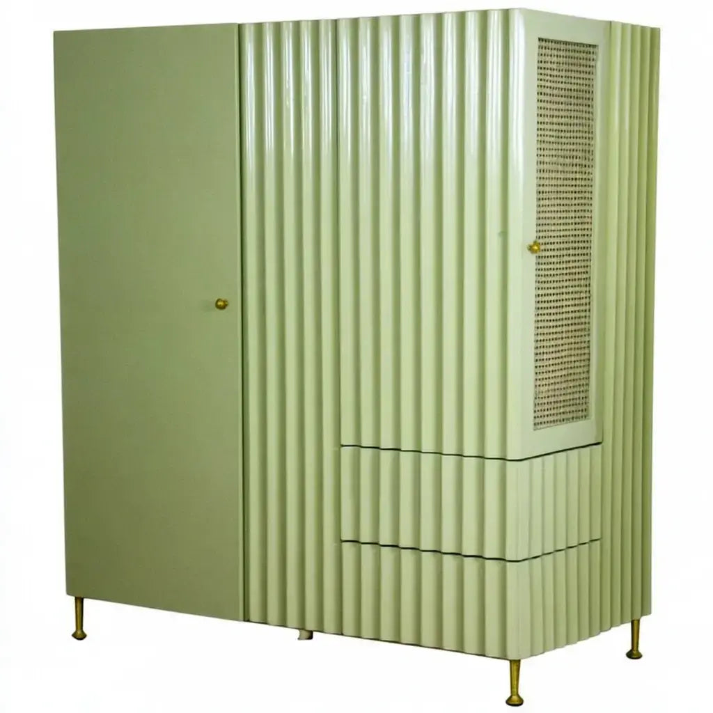 Green Ovendraq armario with striated doors and side drawers, showcasing modern storage design and textured finish.