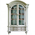 Green Ovendraq best seller vitrina with ornamental top and lower drawers, showcasing elegant storage and decorative design.