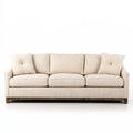 Beige Ovendraq best seller sofa with straight arms and loose cushions, showcasing comfortable seating and modern design.
